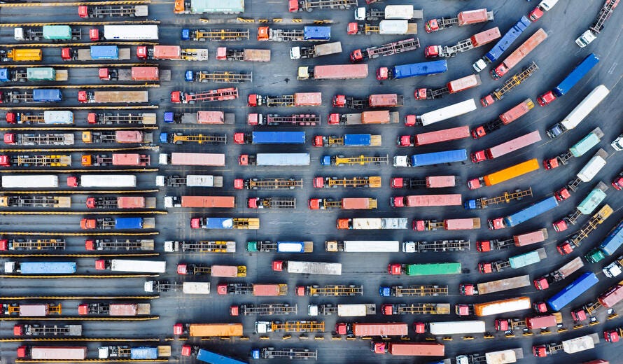 Aerial View of Trucks Entering Container Terminal