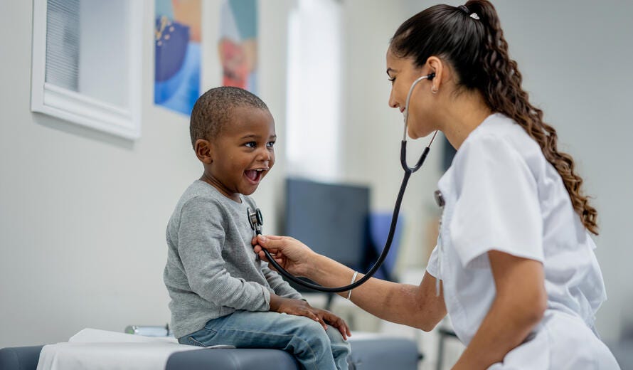 A doctor preforms a check-up.