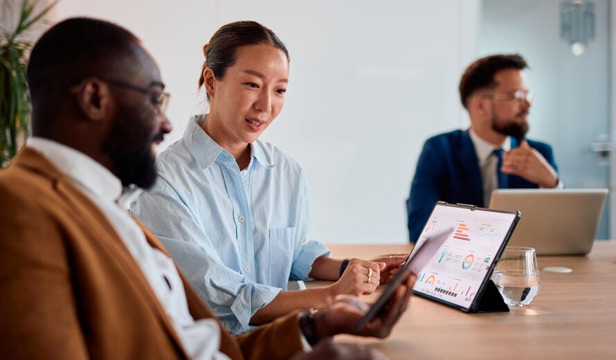 Two business colleagues collaborating in an office